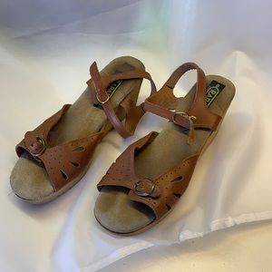 Slightly worn buckle sandals